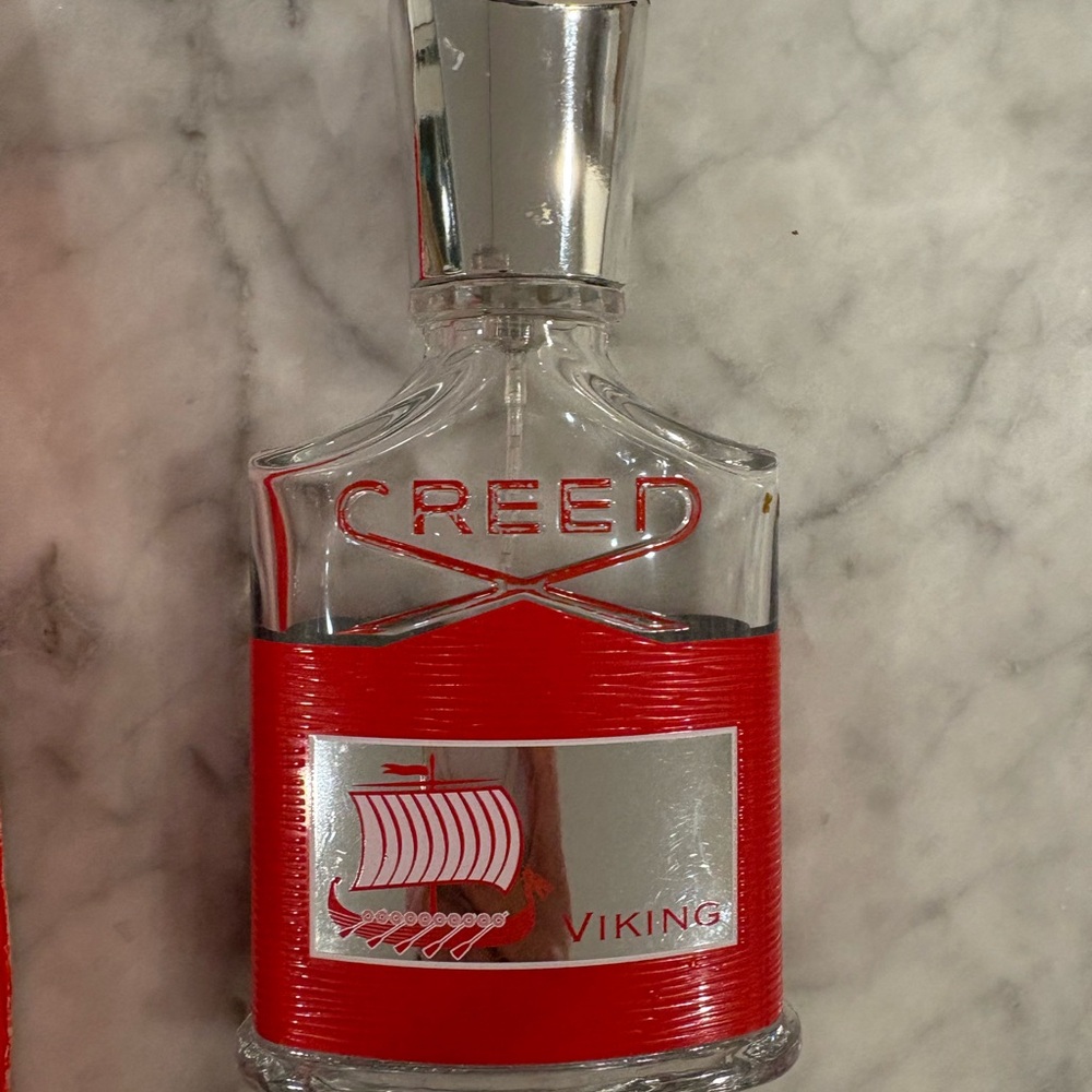 Creed Viking Fragrance in Red and Silver empty bottle